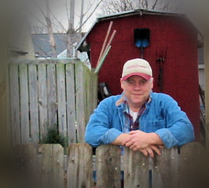 Steve Maurer, founder of Re-Channeled.com, standing behind his "Gate to Nowhere." Re-Channeled.com is a website dedicated to baby boomer buddies and is designed to help them take their rightful place in society.